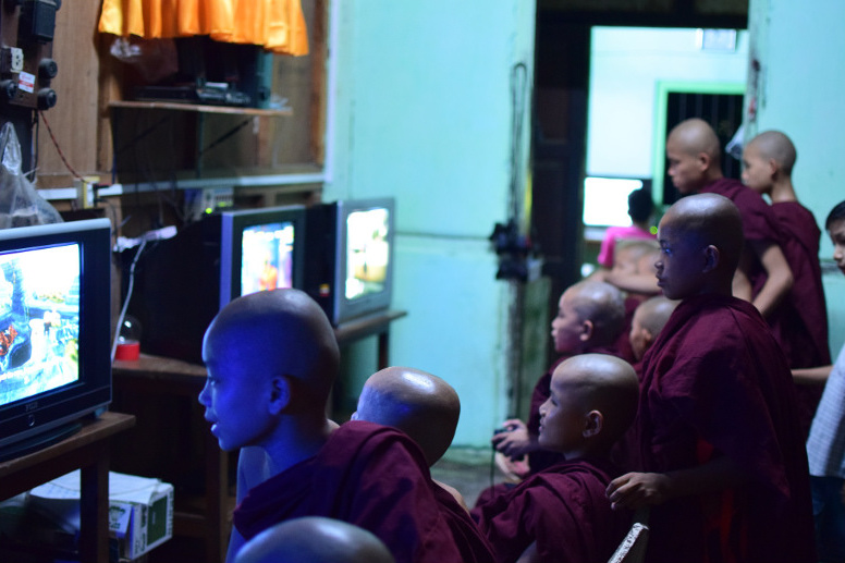 Young Monks playing computer games | Burma